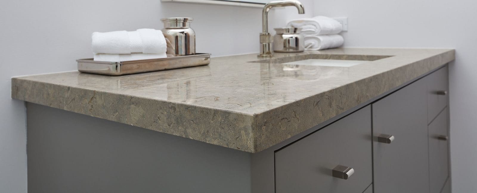 https://englishmarbleandgranite.com/wp-content/uploads/2024/06/66771f6dd5a12_limestone-vanity.jpg