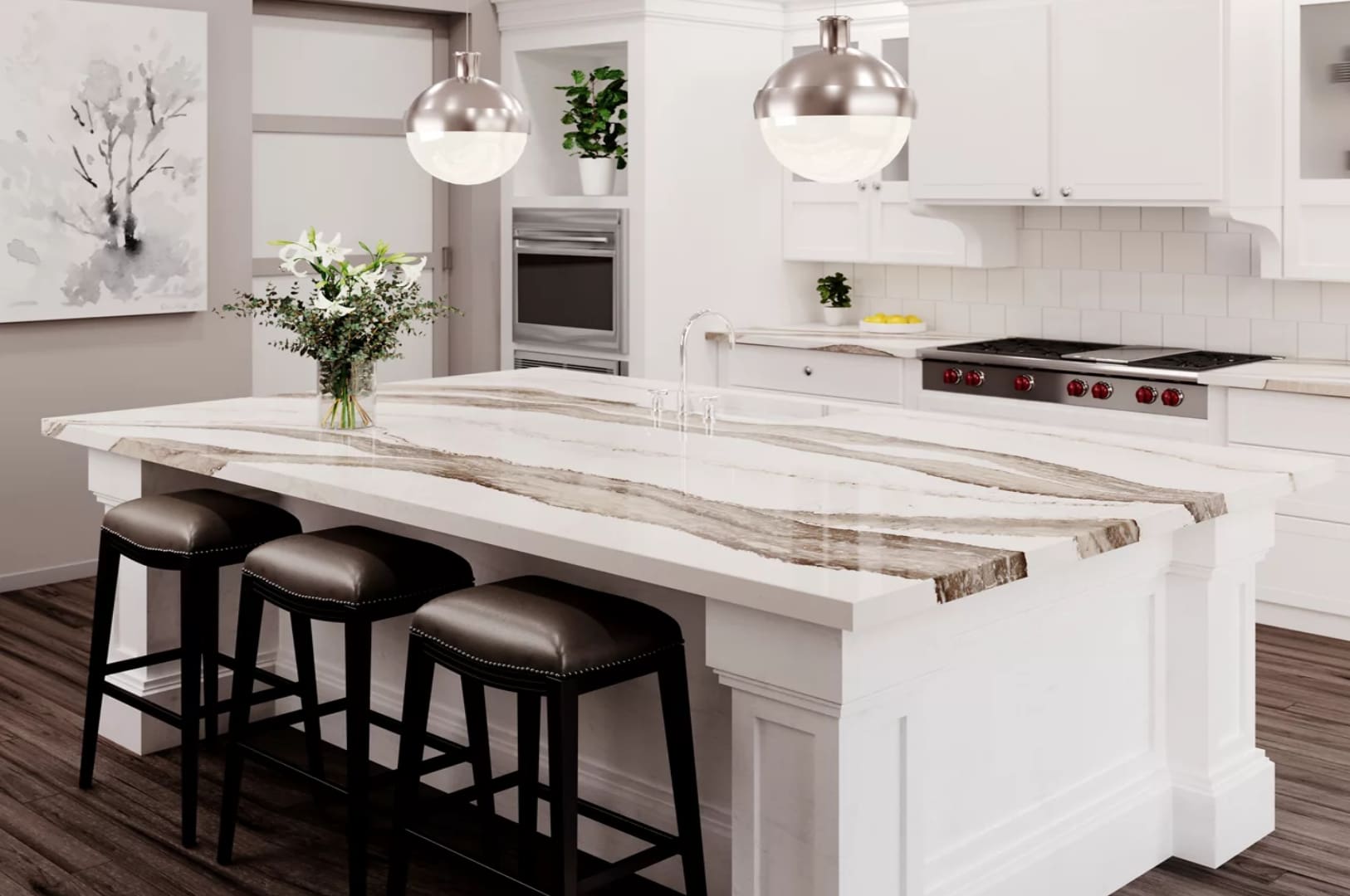 A kitchen with white cabinets and marble counter tops.