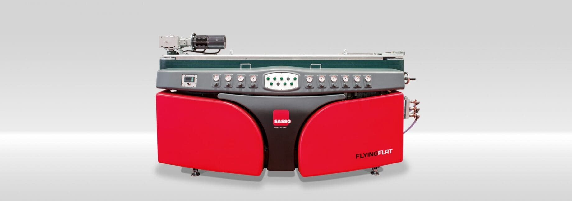 A red and black stereo with speakers on top of it.